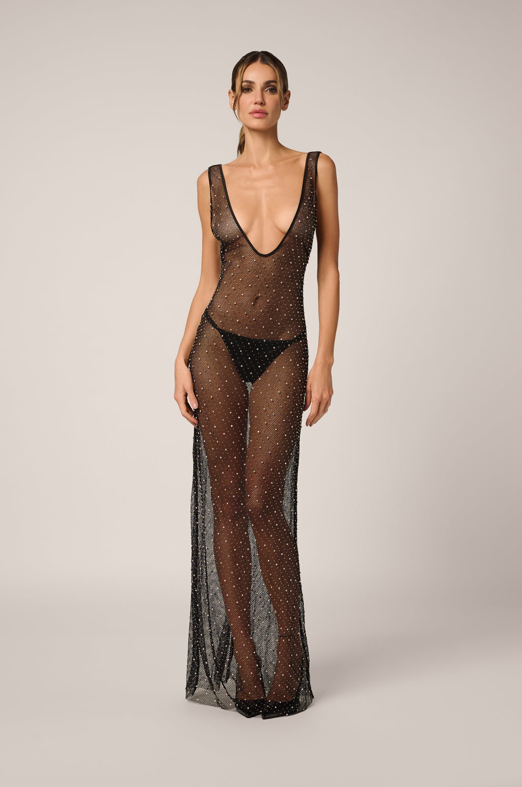 Sheer v-neck gown with rhinestone embellishments front view