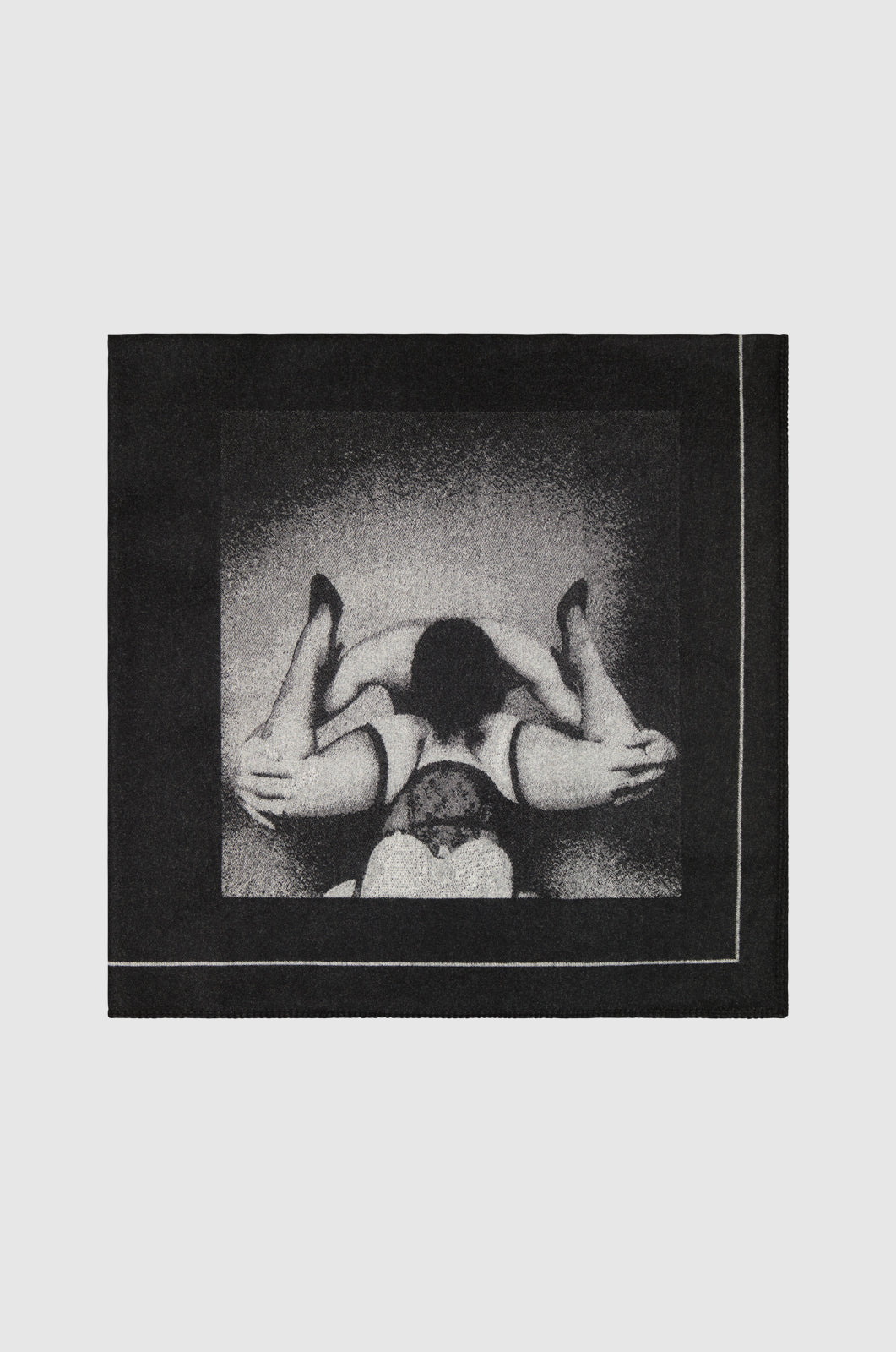 Black throw blanket printed with Untitled work by Robert Mapplethorpe